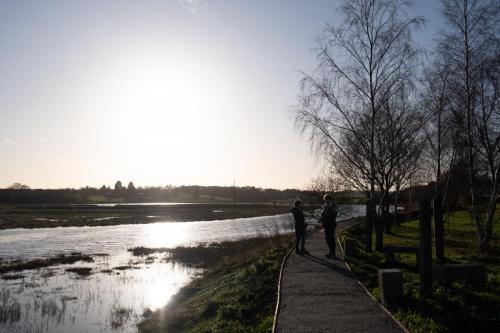 0971-007-sue-calum-walking-by-roman-river